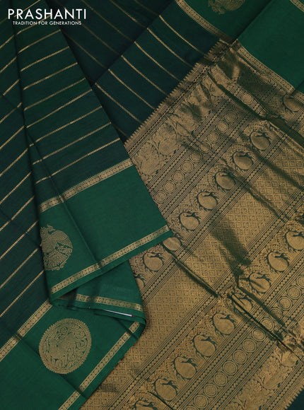 Kanchi cotton saree green with allover zari weaves and rettapet zari woven border