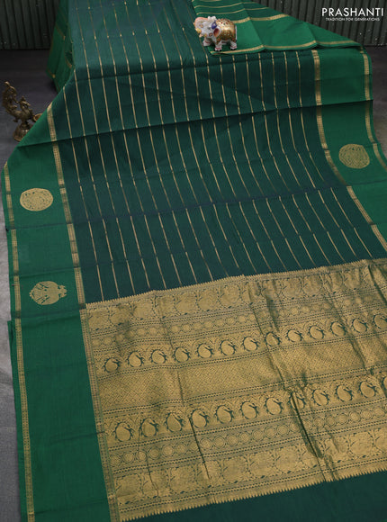 Kanchi cotton saree green with allover zari weaves and rettapet zari woven border