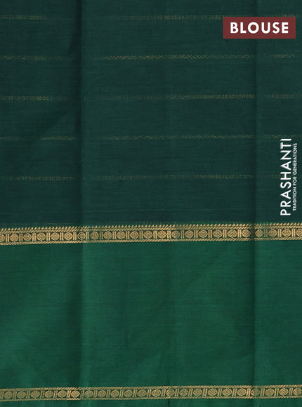 Kanchi cotton saree green with allover zari weaves and rettapet zari woven border
