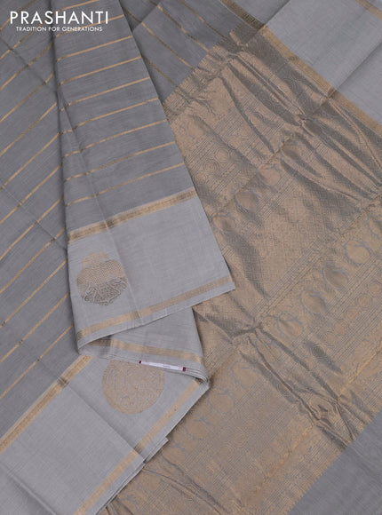 Kanchi cotton saree pastel grey with allover zari weaves and rettapet zari woven border