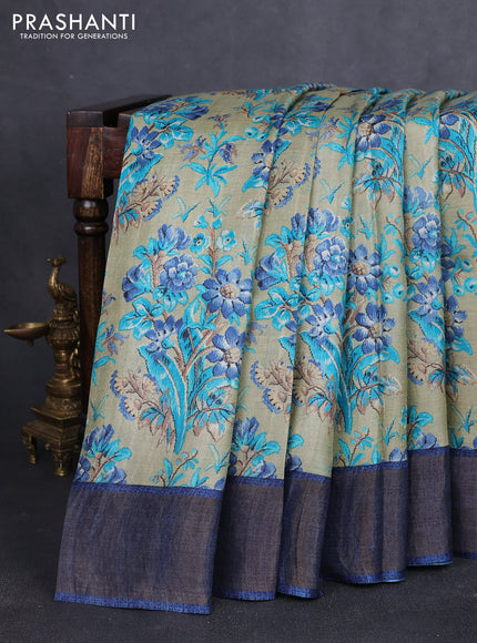 Pure tussar silk saree pastel green and blue with allover prints and zari woven border