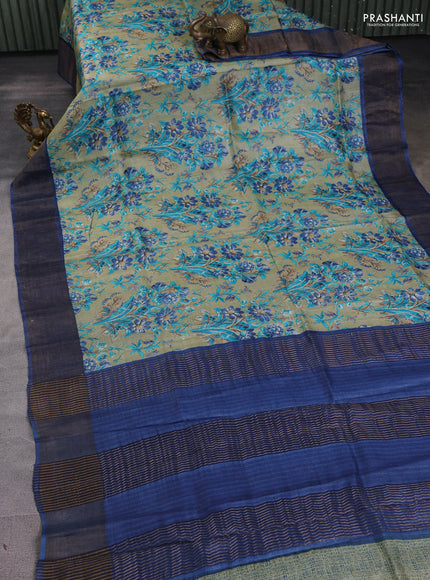 Pure tussar silk saree pastel green and blue with allover prints and zari woven border