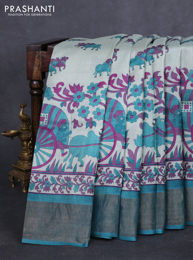 Pure tussar silk saree pastel shade of blue and teal green with allover pichwai prints and zari woven border