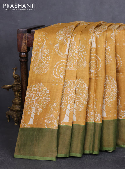 Pure tussar silk saree mustard yellow and mehendi green with allover prints and zari woven border