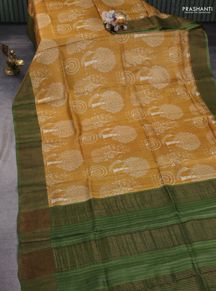 Pure tussar silk saree mustard yellow and mehendi green with allover prints and zari woven border