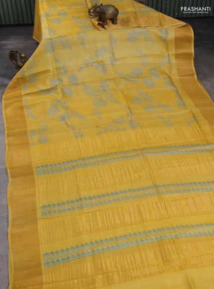 Pure tussar silk saree yellow shade with allover prints and zari woven border