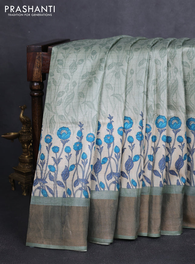 Pure tussar silk saree pastel green with allover prints and zari woven border