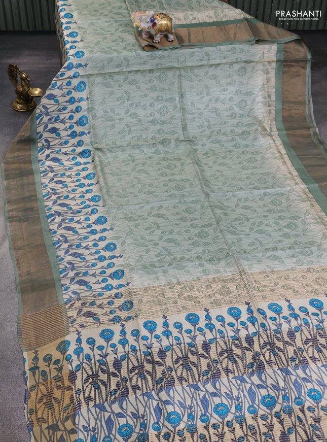 Pure tussar silk saree pastel green with allover prints and zari woven border