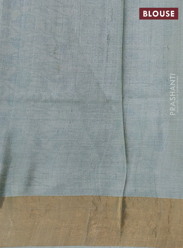 Pure tussar silk saree pastel green with allover prints and zari woven border