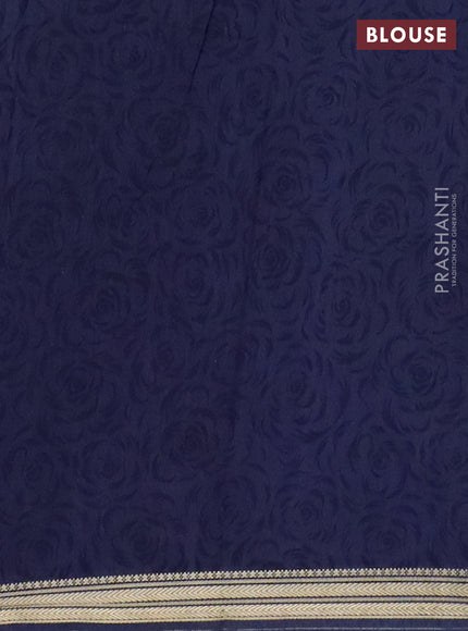 Muslin silk saree maroon and navy blue with allover floral prints and zari woven border