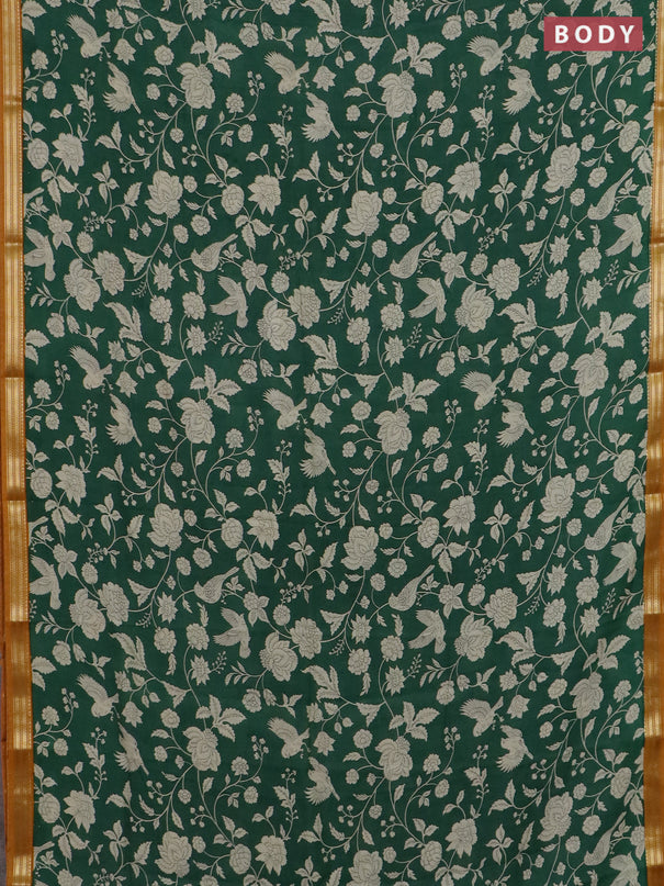 Muslin silk saree green and dark mustard with allover floral prints and zari woven border