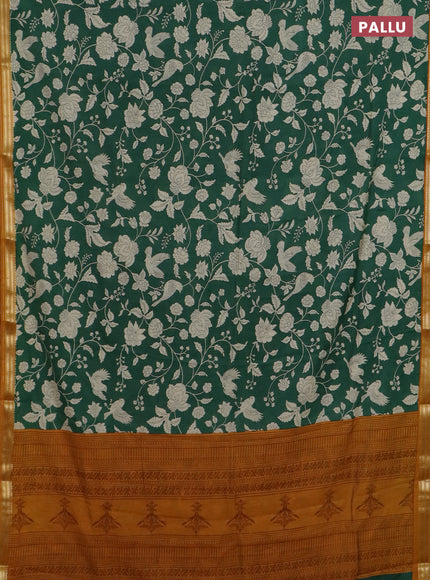 Muslin silk saree green and dark mustard with allover floral prints and zari woven border