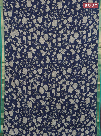 Muslin silk saree navy blue and teal green with allover floral prints and zari woven border