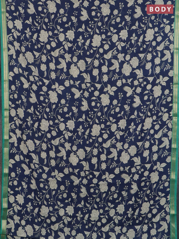 Muslin silk saree navy blue and teal green with allover floral prints and zari woven border