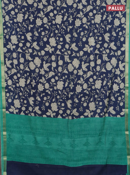 Muslin silk saree navy blue and teal green with allover floral prints and zari woven border