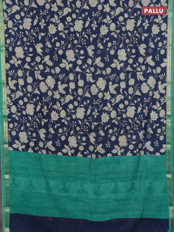 Muslin silk saree navy blue and teal green with allover floral prints and zari woven border