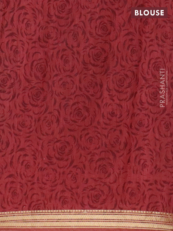 Muslin silk saree black and pastel maroon with allover prints and zari woven border