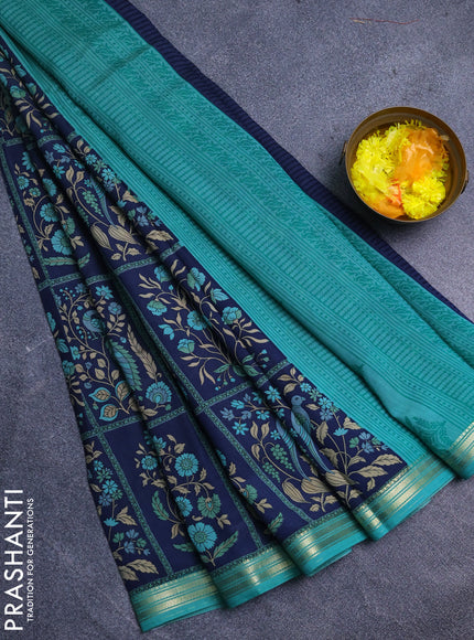 Muslin silk saree navy blue and teal green with allover prints and zari woven border