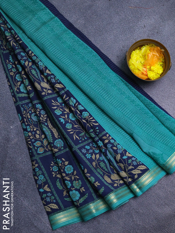 Muslin silk saree navy blue and teal green with allover prints and zari woven border
