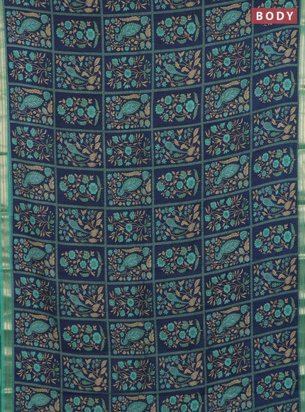 Muslin silk saree navy blue and teal green with allover prints and zari woven border