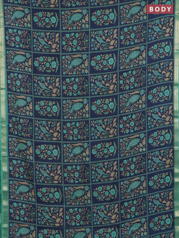 Muslin silk saree navy blue and teal green with allover prints and zari woven border