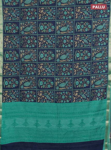 Muslin silk saree navy blue and teal green with allover prints and zari woven border