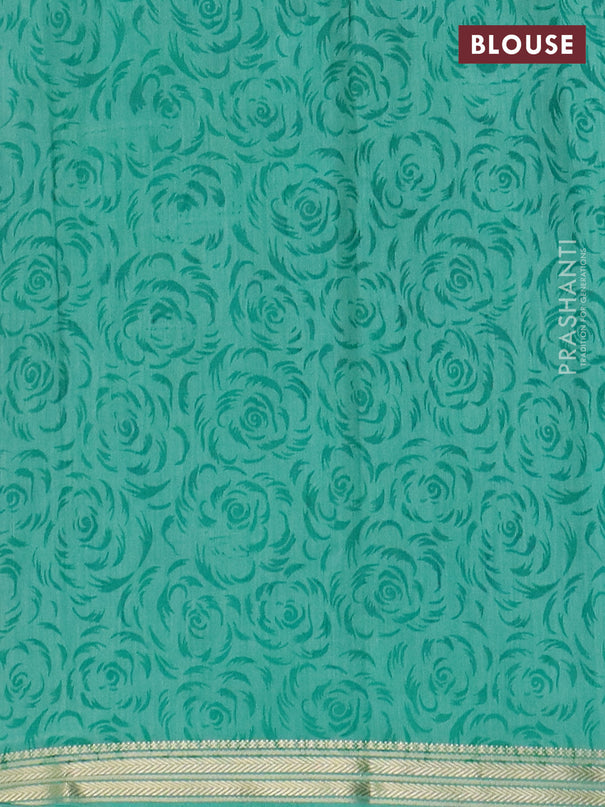 Muslin silk saree navy blue and teal green with allover prints and zari woven border