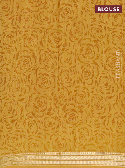 Muslin silk saree coffee brown and mustard yellow with allover prints and zari woven border
