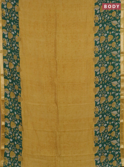 Muslin silk saree mustard yellow and green with prints and long kalamkari printed zari border