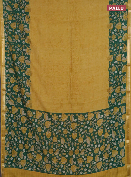 Muslin silk saree mustard yellow and green with prints and long kalamkari printed zari border