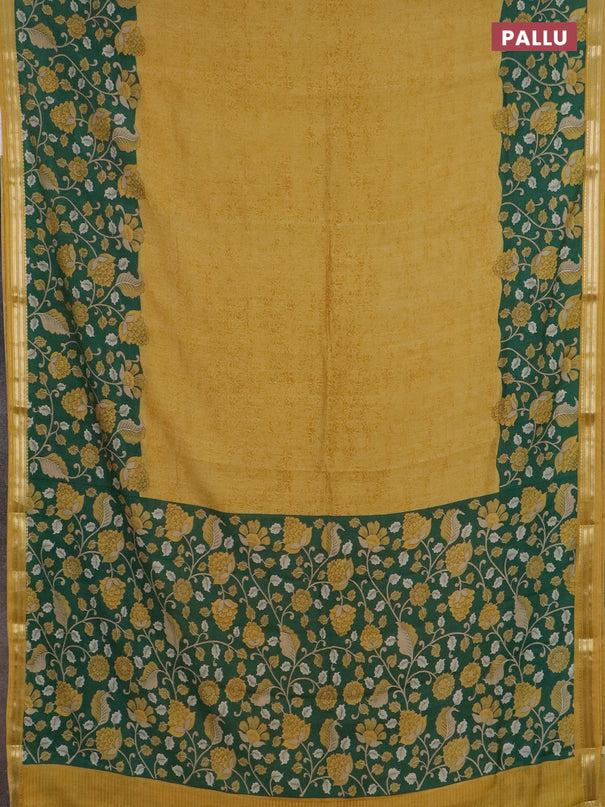 Muslin silk saree mustard yellow and green with prints and long kalamkari printed zari border