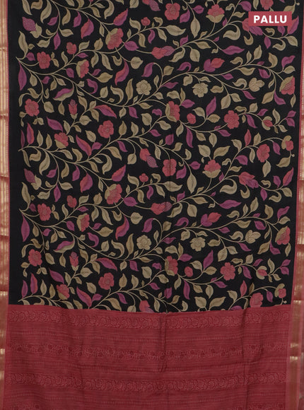 Muslin silk saree black and peach shade with allover prints and zari woven border