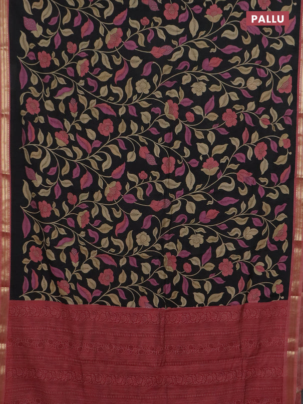 Muslin silk saree black and peach shade with allover prints and zari woven border