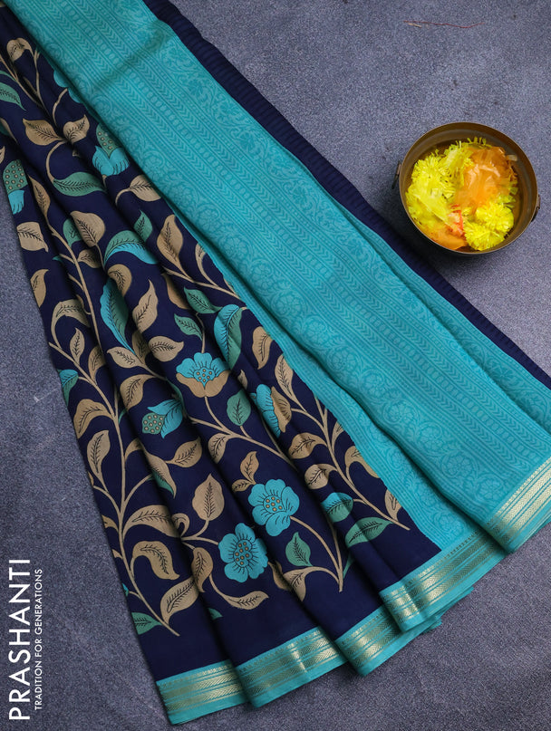 Muslin silk saree navy blue and teal green with allover prints and zari woven border