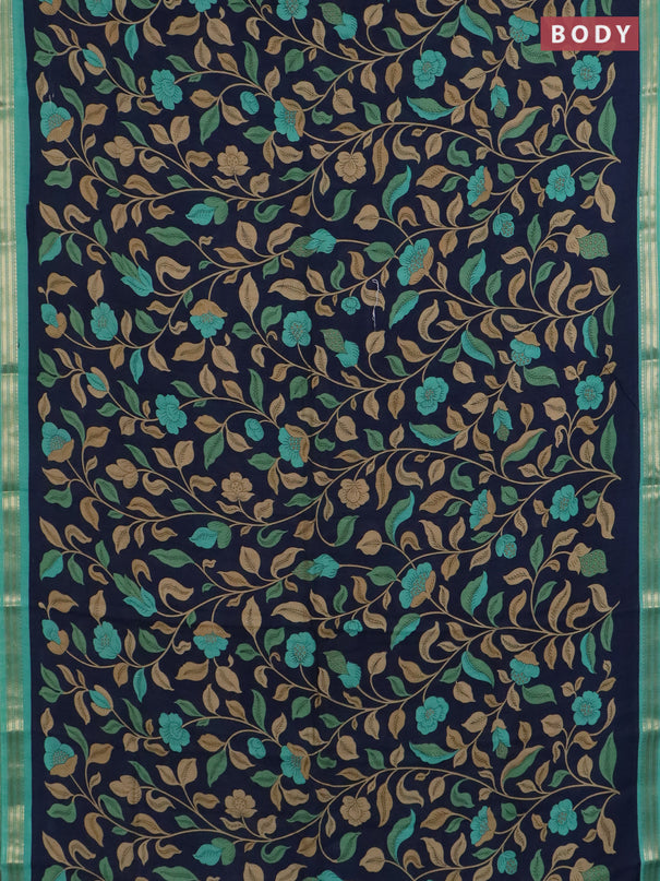 Muslin silk saree navy blue and teal green with allover prints and zari woven border