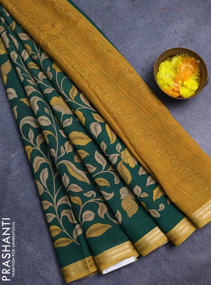 Muslin silk saree green and mustard yellow with allover prints and zari woven border