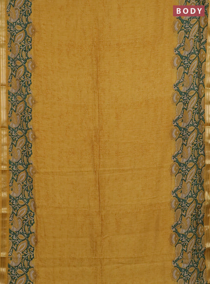 Muslin silk saree mustard yellow and green with prints and long kalamkari printed zari border