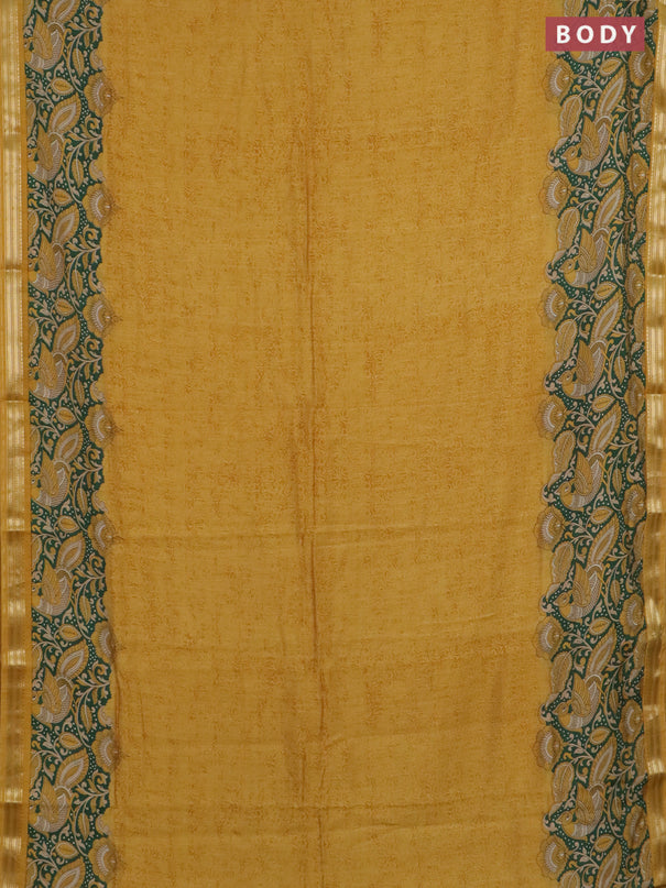Muslin silk saree mustard yellow and green with prints and long kalamkari printed zari border