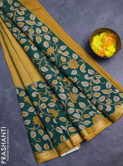 Muslin silk saree mustard yellow and green with prints and long kalamkari printed zari border