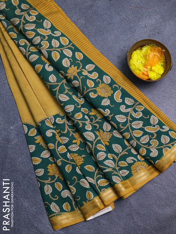Muslin silk saree mustard yellow and green with prints and long kalamkari printed zari border