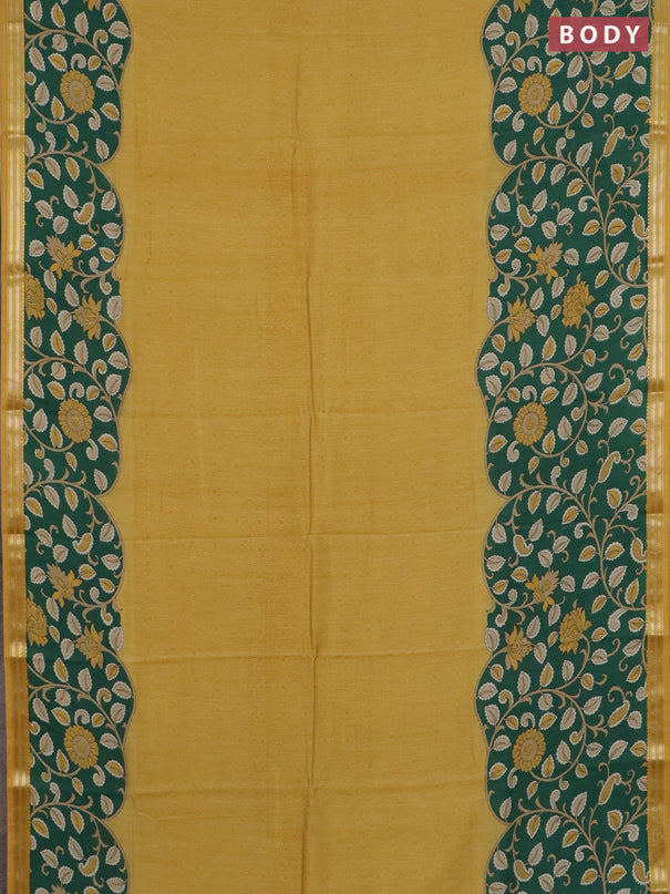 Muslin silk saree mustard yellow and green with prints and long kalamkari printed zari border