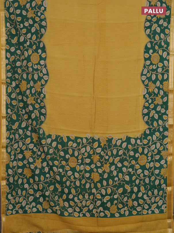 Muslin silk saree mustard yellow and green with prints and long kalamkari printed zari border