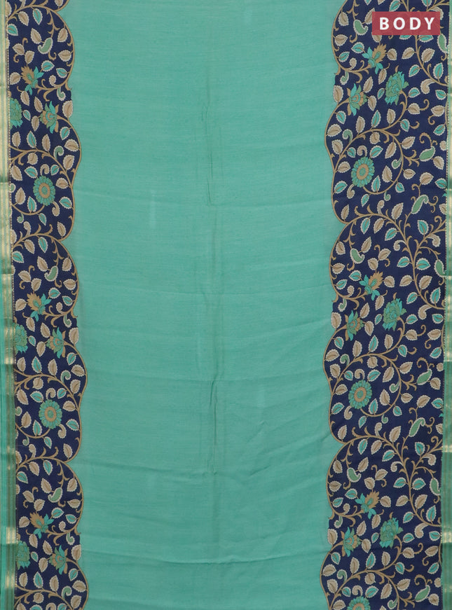Muslin silk saree teal green and navy blue with prints and long kalamkari printed zari border