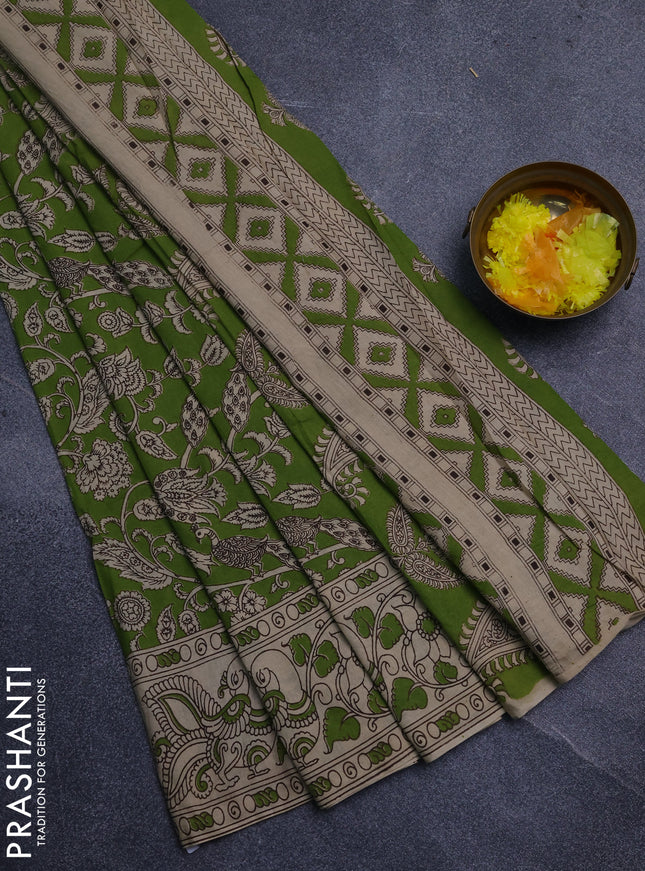 Kalamkari cotton saree light green and beige with allover prints and printed border