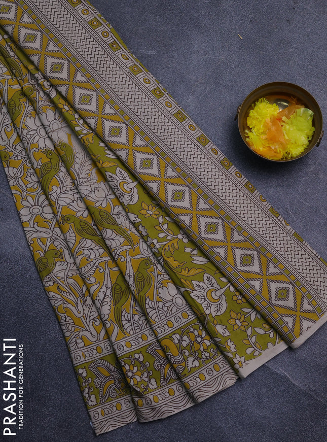 Kalamkari cotton saree yellow and light green with allover prints and printed border