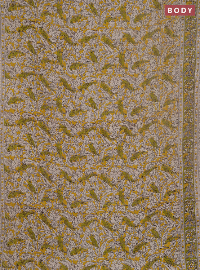 Kalamkari cotton saree yellow and light green with allover prints and printed border