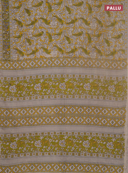Kalamkari cotton saree yellow and light green with allover prints and printed border