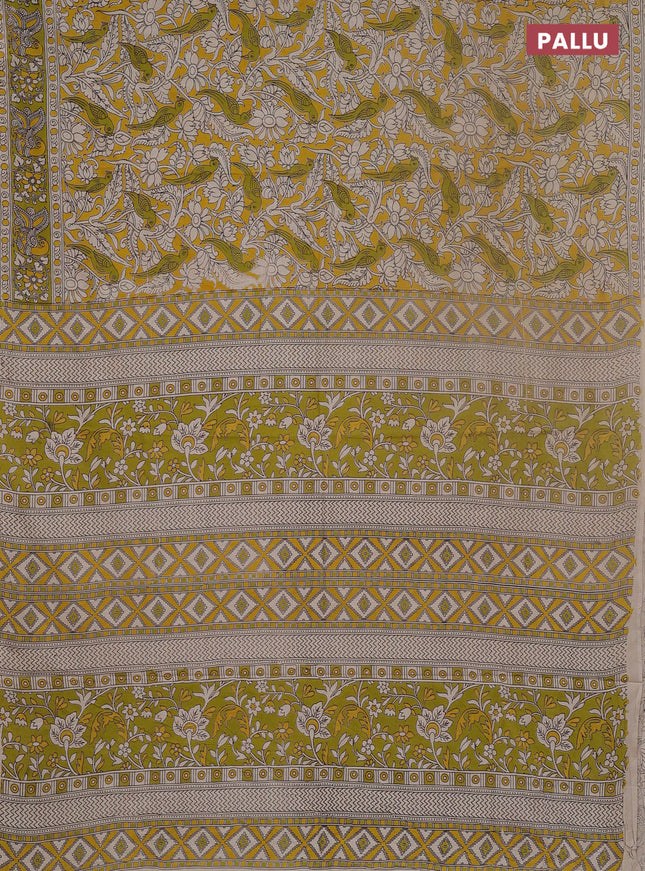 Kalamkari cotton saree yellow and light green with allover prints and printed border