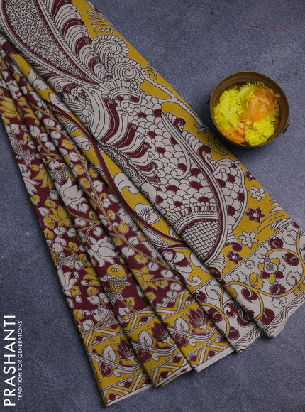 Kalamkari cotton saree wine shade and yellow with allover prints and printed border