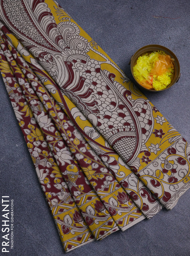 Kalamkari cotton saree wine shade and yellow with allover prints and printed border